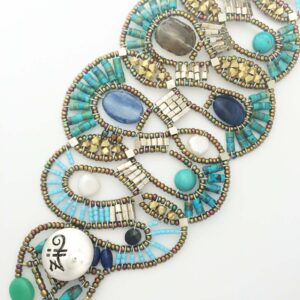 Fancy cuff in semi precious stones of turquoise,quartz, and murano glass